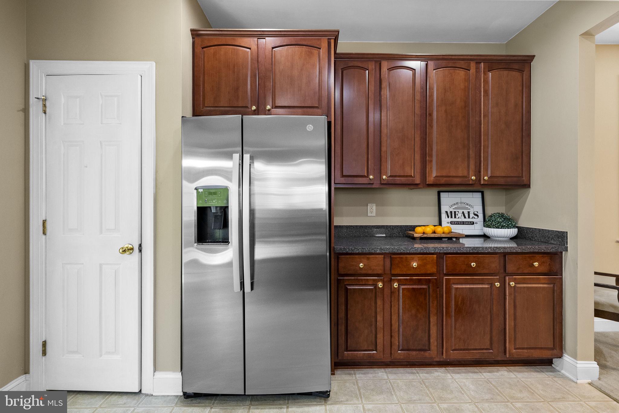 117 George Street Robbinsville, NJ 08691 - Photo 14 of 55 a kitchen with metallic refrigerator freezer and a dishwasher