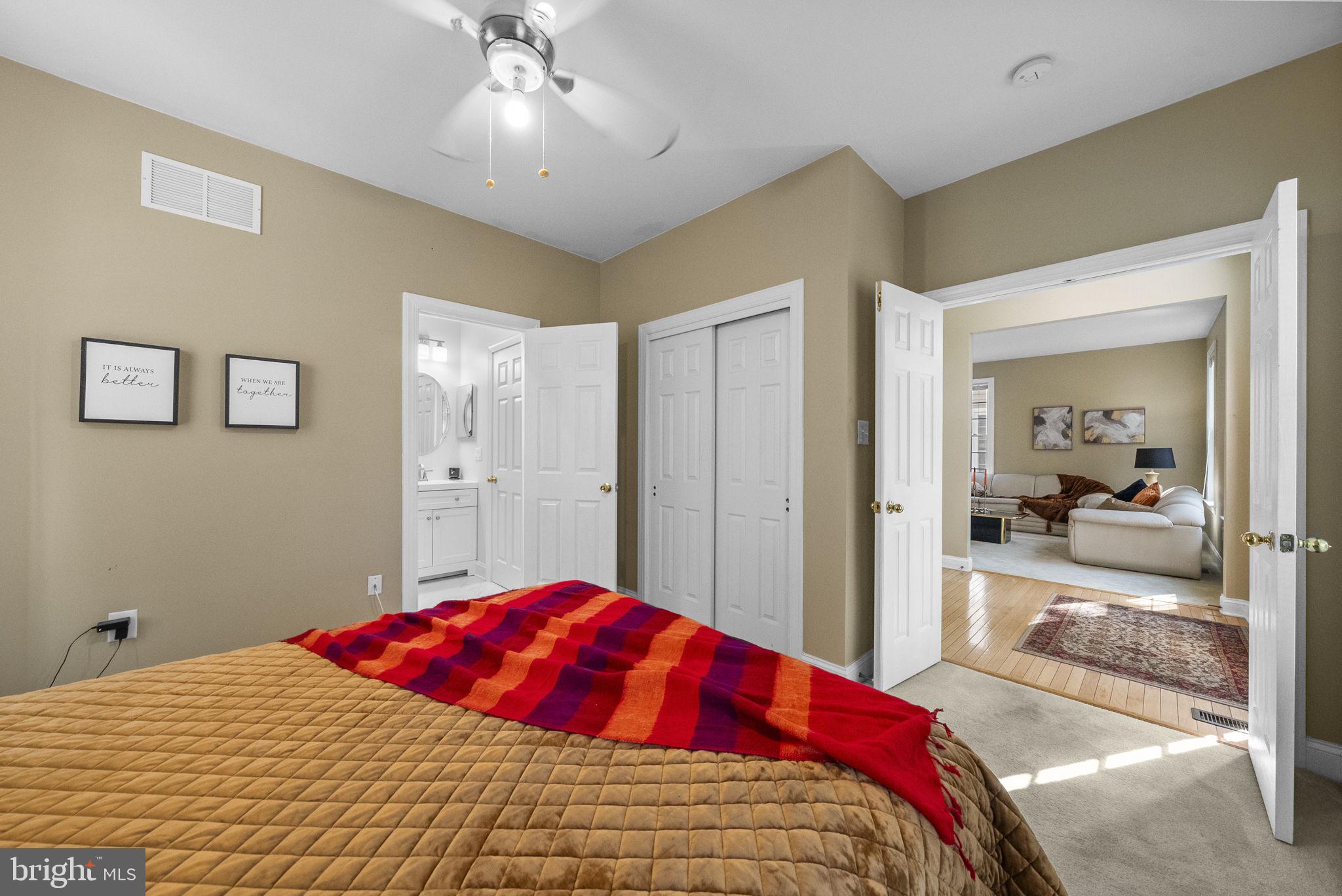 117 George Street Robbinsville, NJ 08691 - Photo 24 of 55 a bedroom with a large bed and a glass door