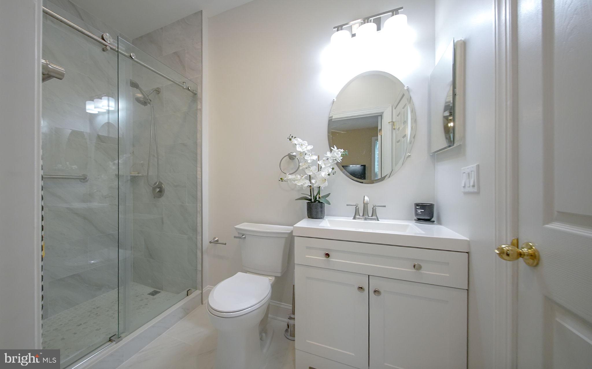 117 George Street Robbinsville, NJ 08691 - Photo 25 of 55 a bathroom with a toilet sink and shower
