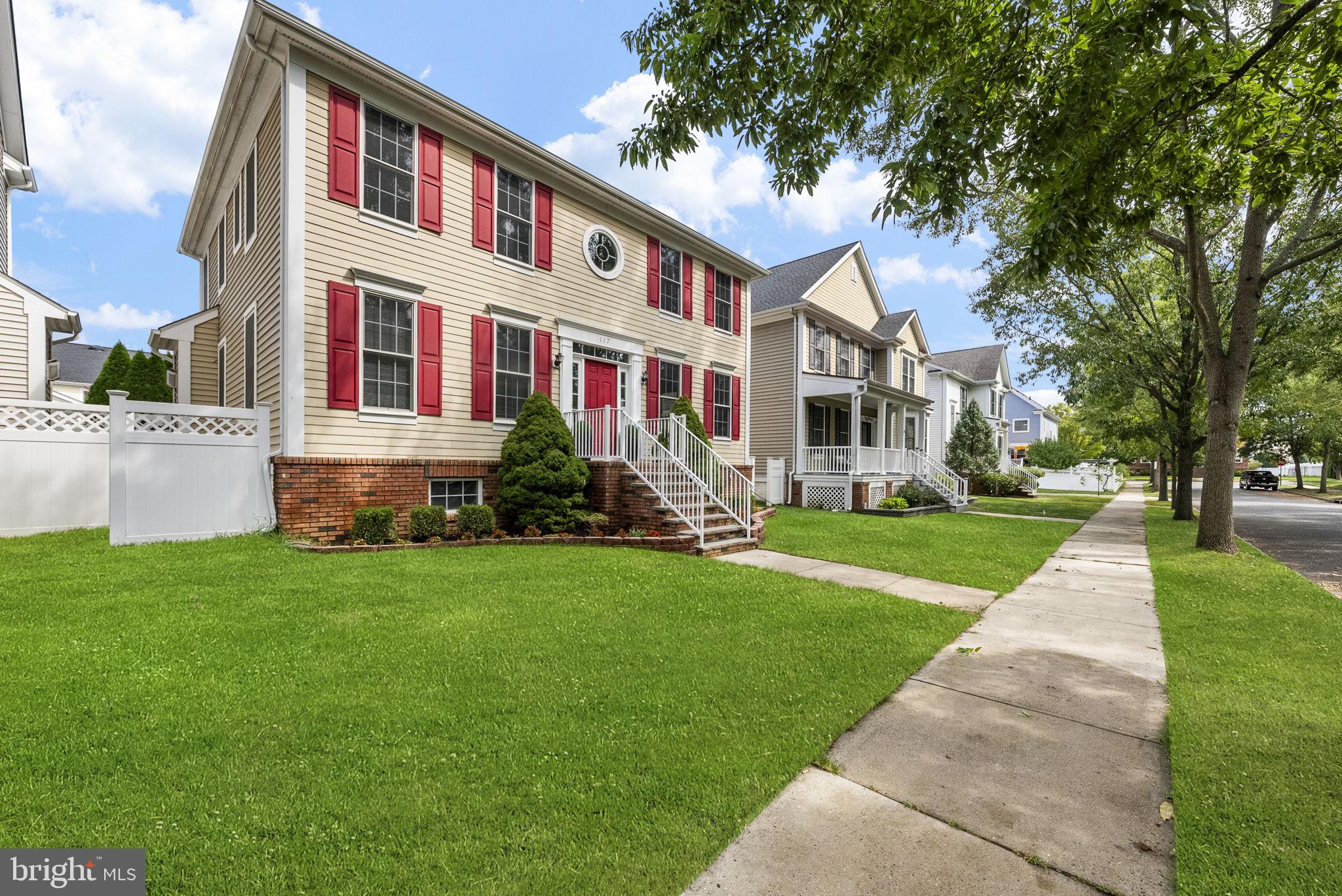 117 George Street Robbinsville, NJ 08691 - Photo 4 of 55 a front view of house with yard and green space