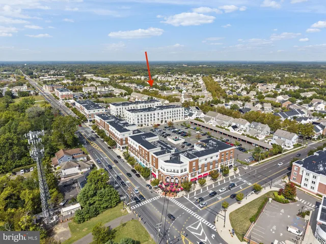 an aerial view of a city with lots of residential buildings