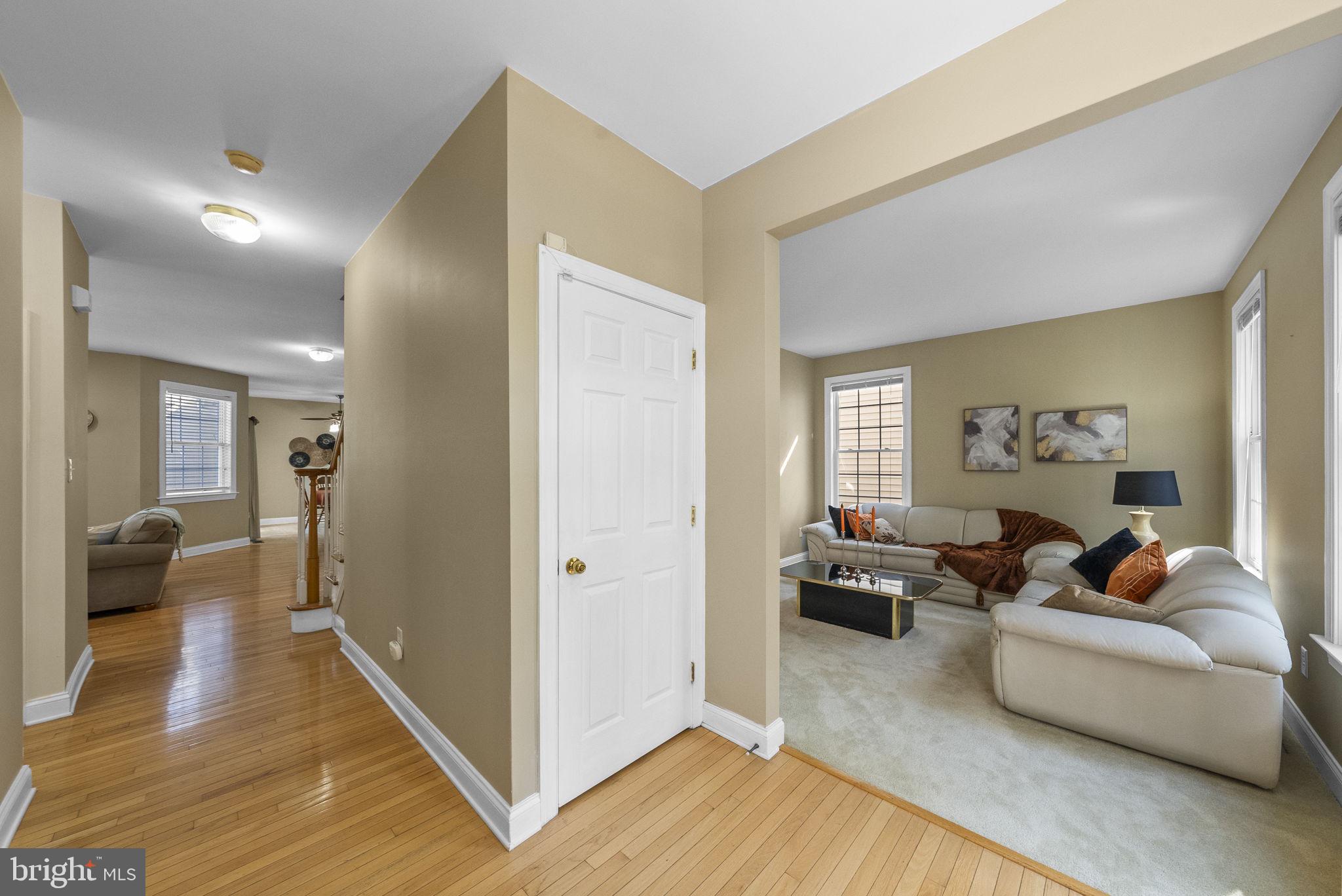 117 George Street Robbinsville, NJ 08691 - Photo 6 of 55 a living room with furniture and a wooden floor