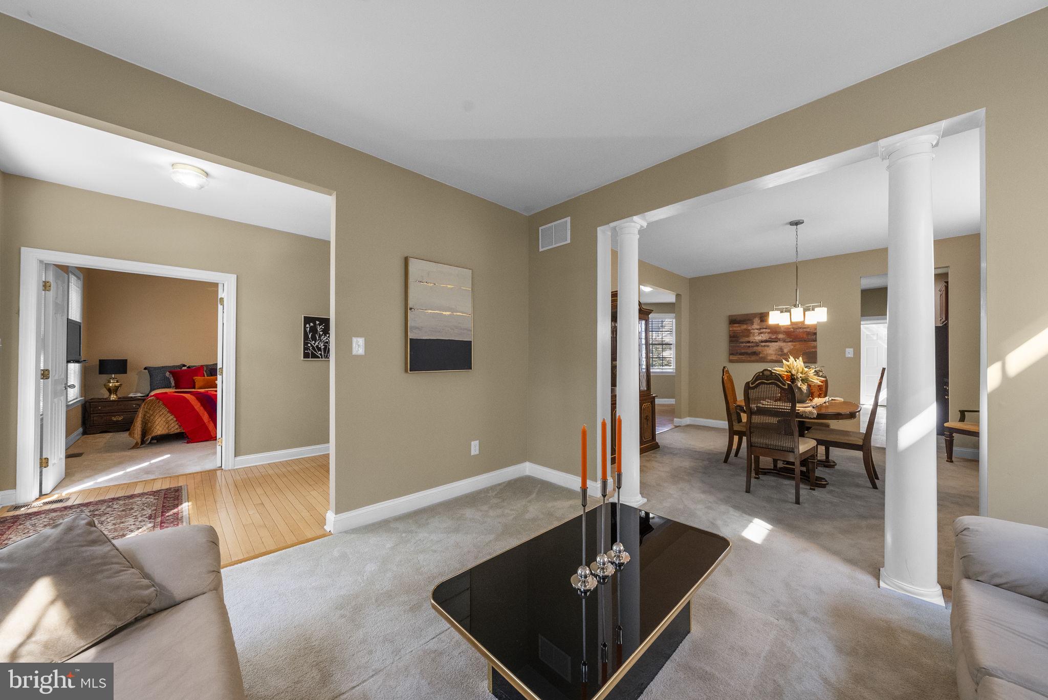 117 George Street Robbinsville, NJ 08691 - Photo 7 of 55 a living room with furniture and a large window