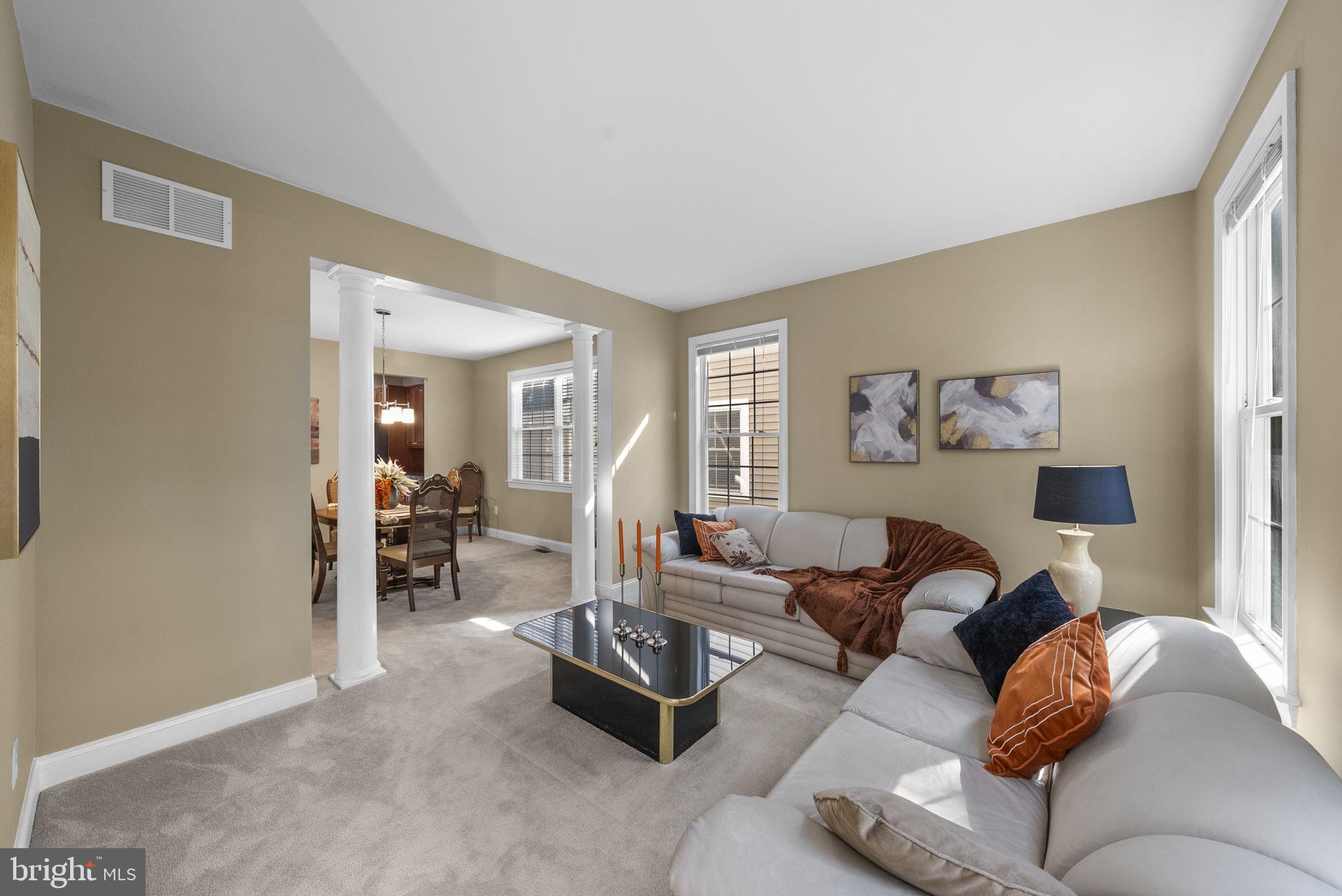 117 George Street Robbinsville, NJ 08691 - Photo 9 of 55 a living room with furniture and a large window