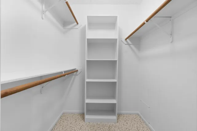a view of an empty walk in closet