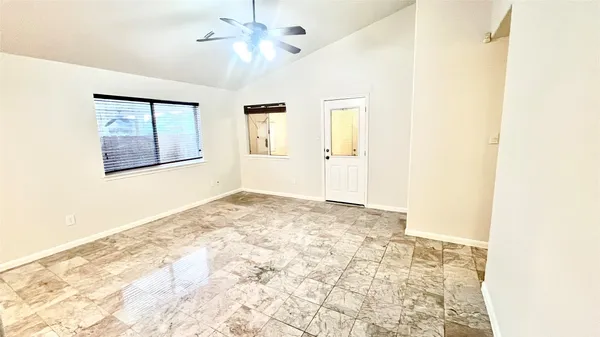 a view of livingroom with kitchen