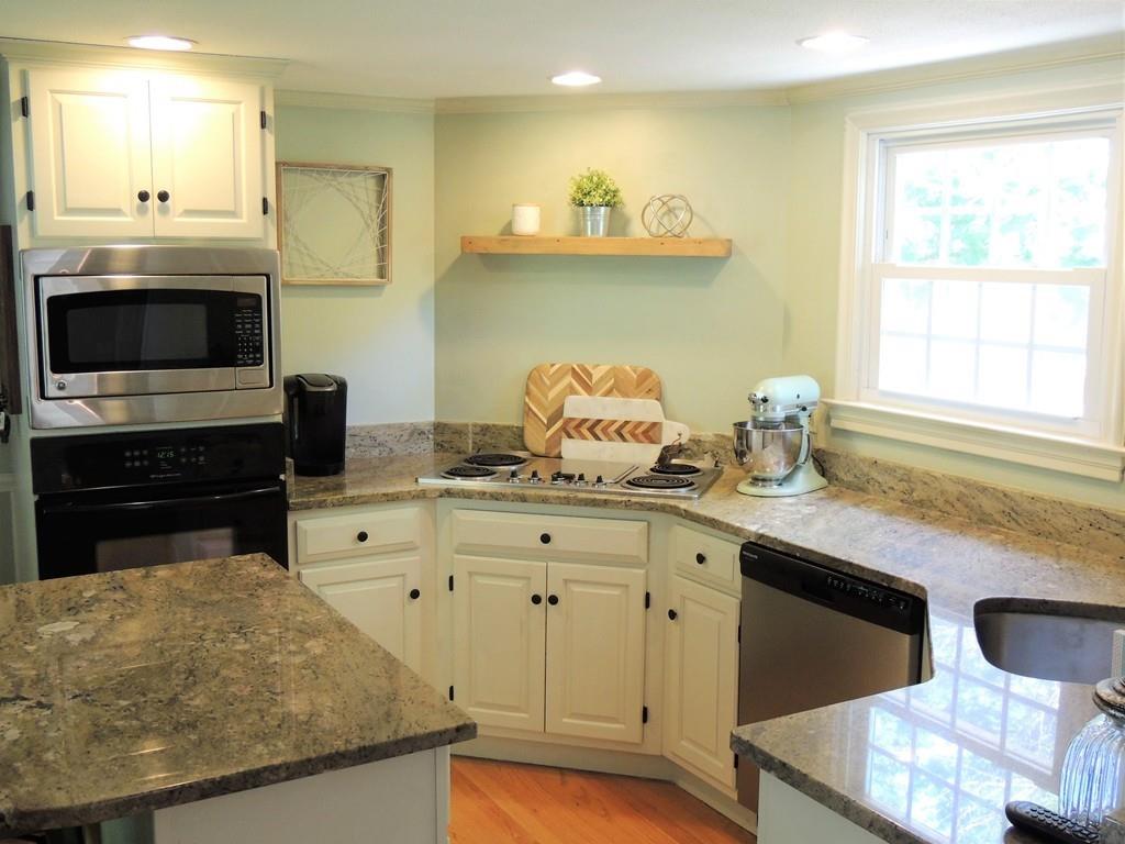 1321 Plumtree Road Springfield, MA 01119 - Photo 16 of 36 a kitchen with granite countertop a sink and a stove