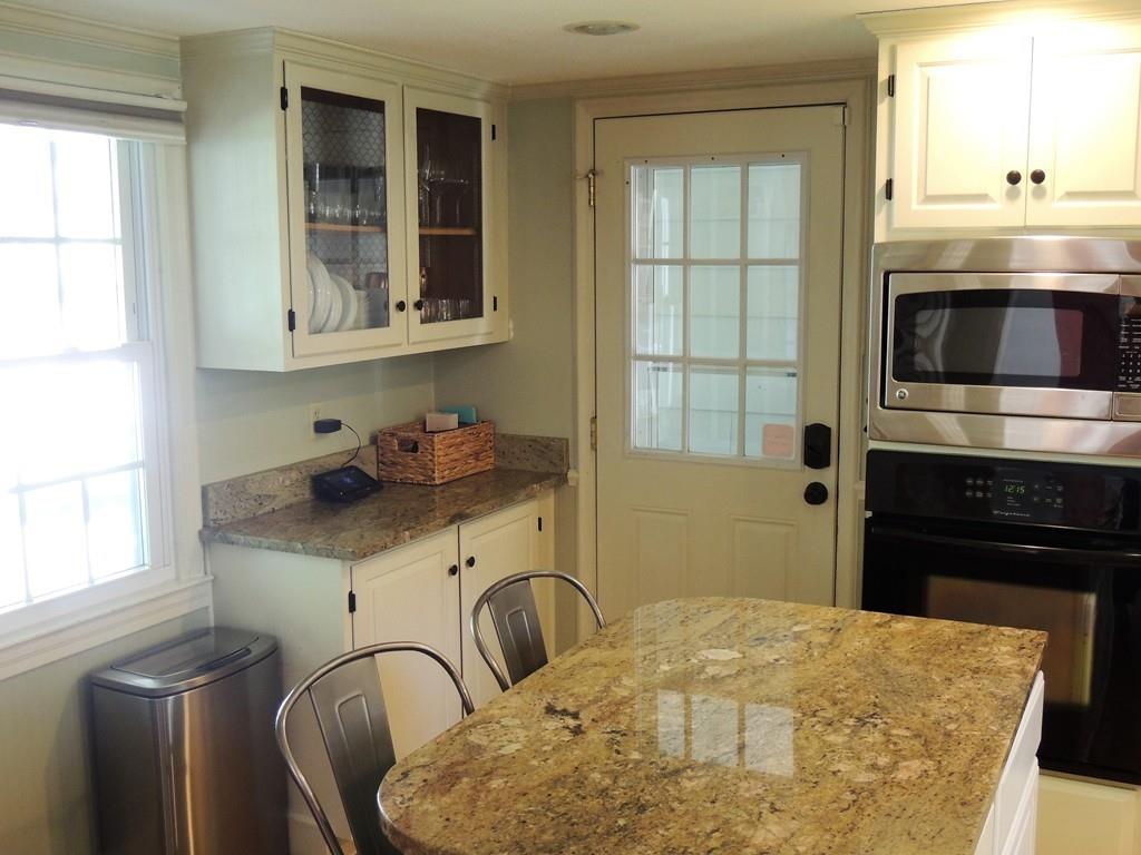 1321 Plumtree Road Springfield, MA 01119 - Photo 18 of 36 a kitchen with a stove a sink and a refrigerator