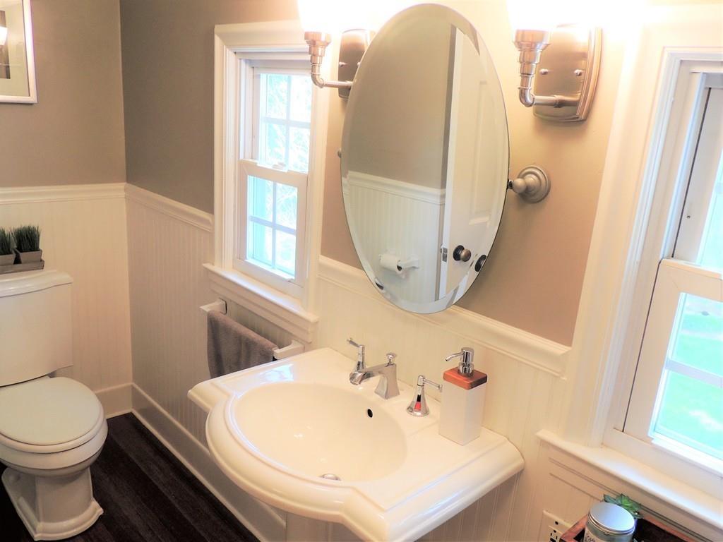 1321 Plumtree Road Springfield, MA 01119 - Photo 33 of 36 a bathroom with a sink a toilet and a mirror