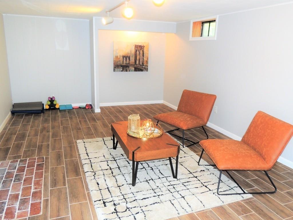 1321 Plumtree Road Springfield, MA 01119 - Photo 35 of 36 a view of a livingroom with lounge chair and a rug