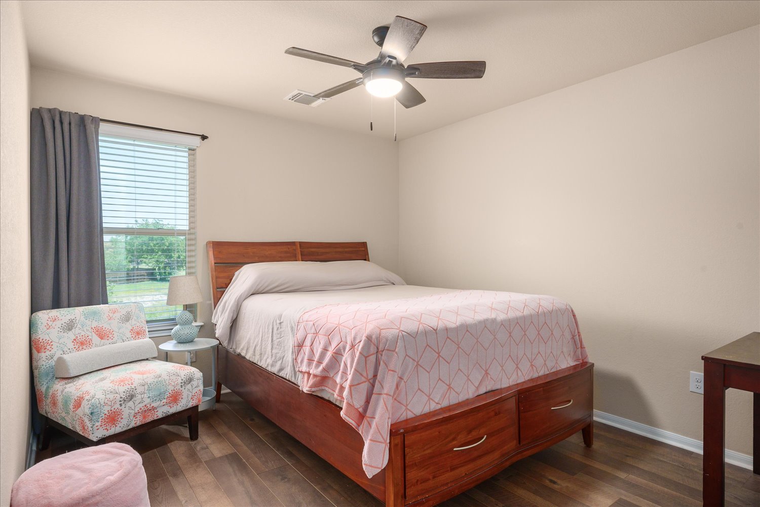 717 Kaluga Trail Leander, TX 78641 - Photo 22 of 40 a bedroom with a bed and with couches