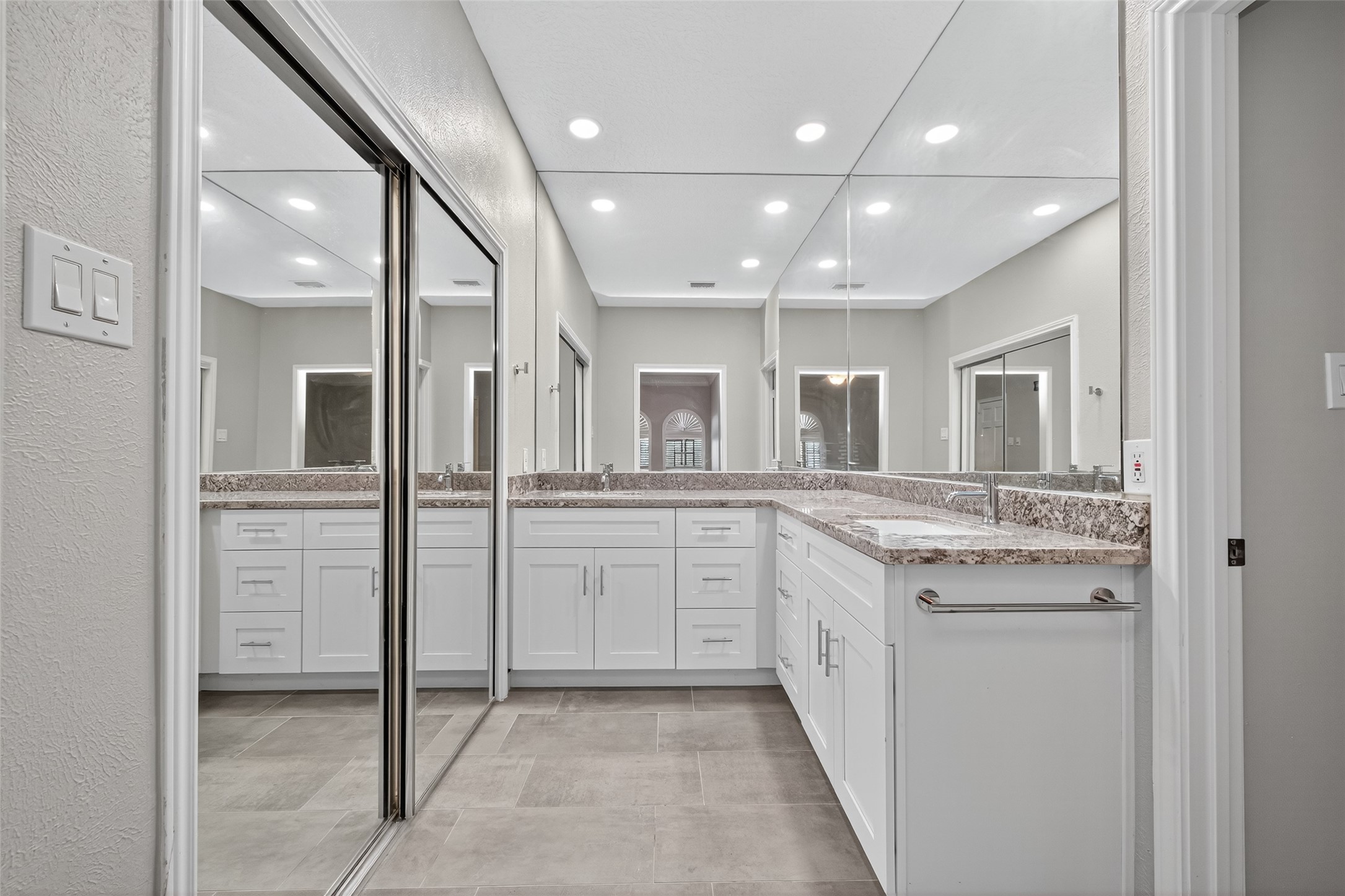 901 Longmire Road, Unit 13 Conroe, TX 77304 - Photo 32 of 46 a large kitchen with a sink and dishwasher a refrigerator with wooden floor