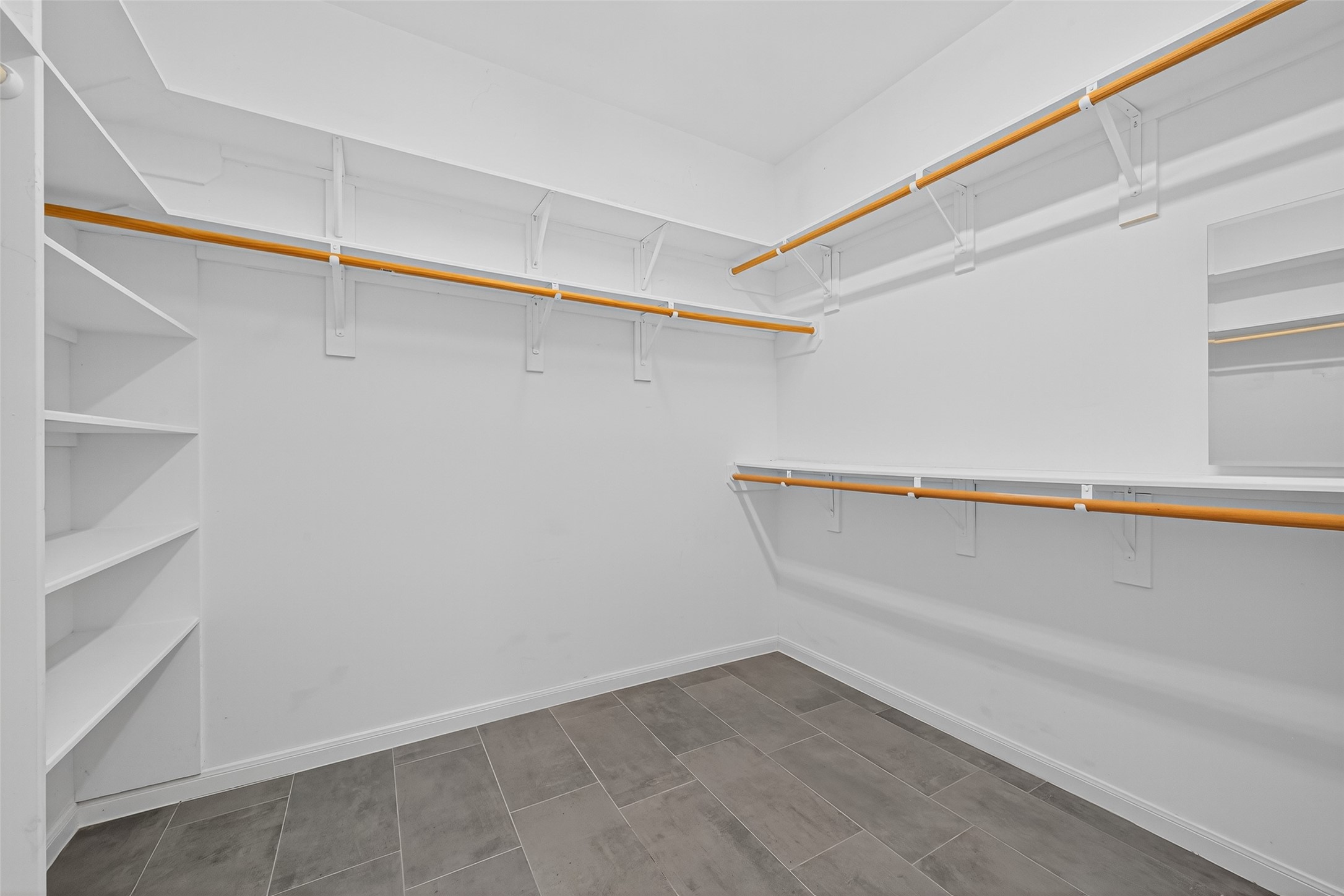 901 Longmire Road, Unit 13 Conroe, TX 77304 - Photo 36 of 46 a view of an empty walk in closet