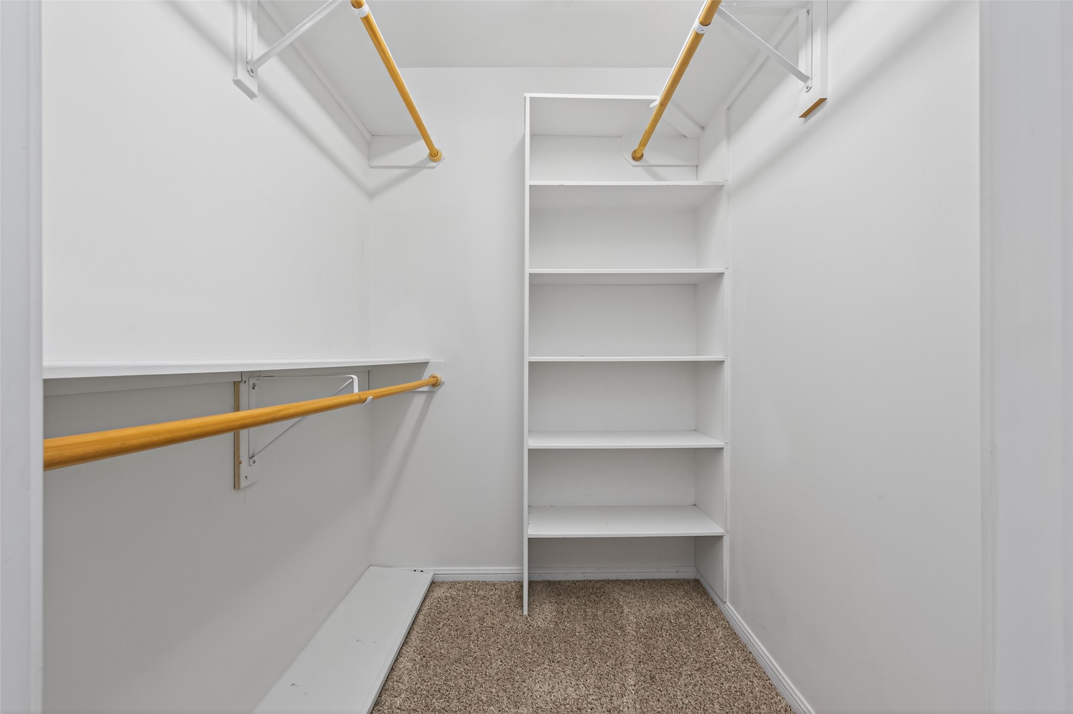 901 Longmire Road, Unit 13 Conroe, TX 77304 - Photo 42 of 46 a view of an empty walk in closet