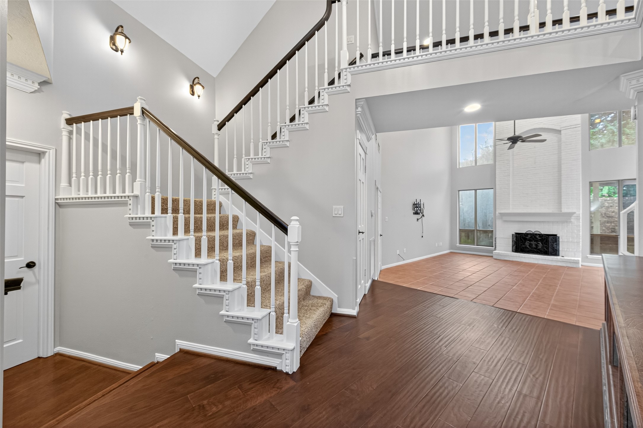 901 Longmire Road, Unit 13 Conroe, TX 77304 - Photo 5 of 46 a view of entryway and hall with wooden floor