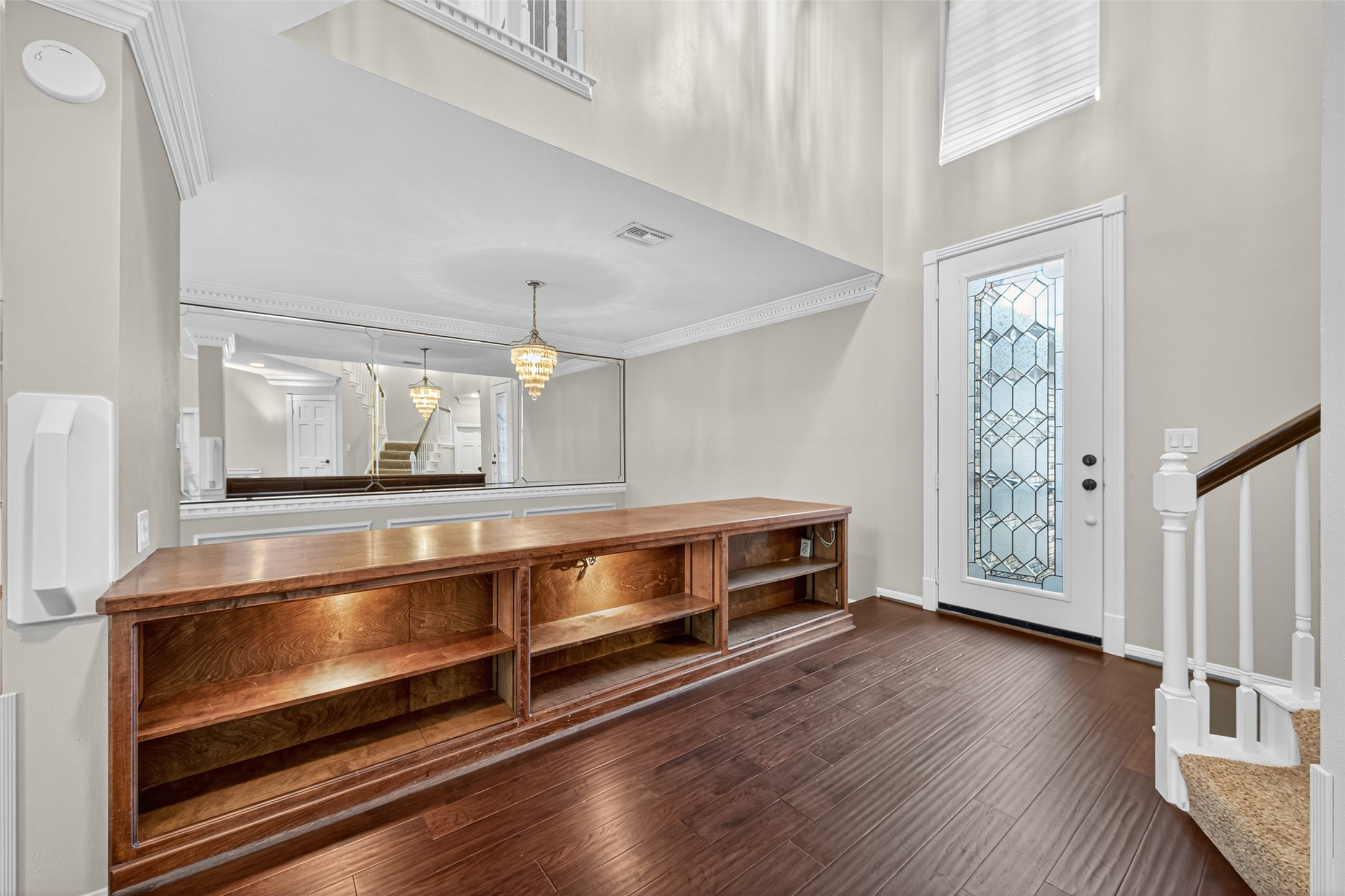 901 Longmire Road, Unit 13 Conroe, TX 77304 - Photo 6 of 46 a view of room with window and wooden floor