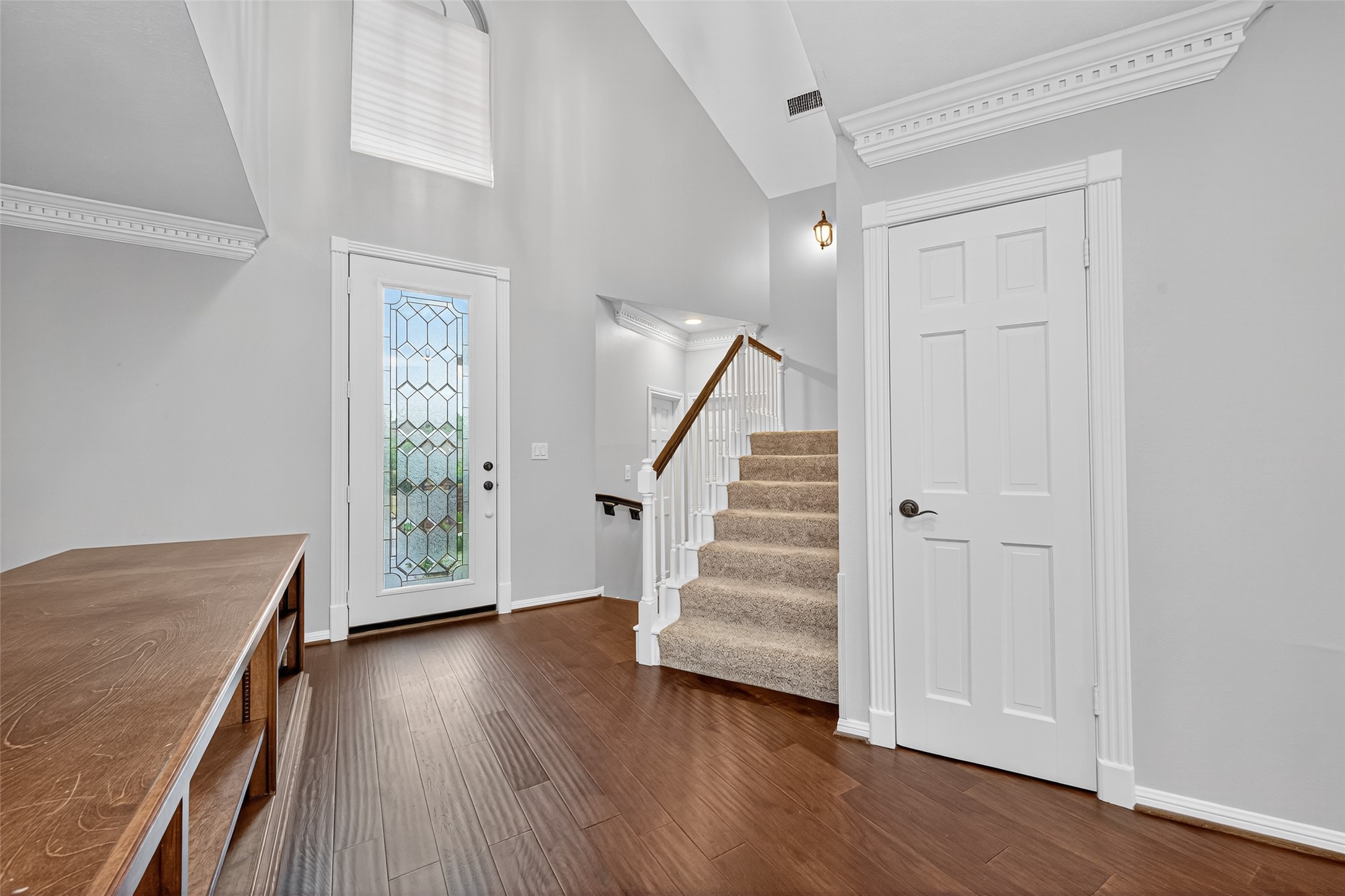 901 Longmire Road, Unit 13 Conroe, TX 77304 - Photo 7 of 46 a view of a room with wooden floor and stairs