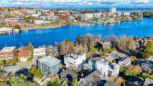 a view of a balcony with chairs and table