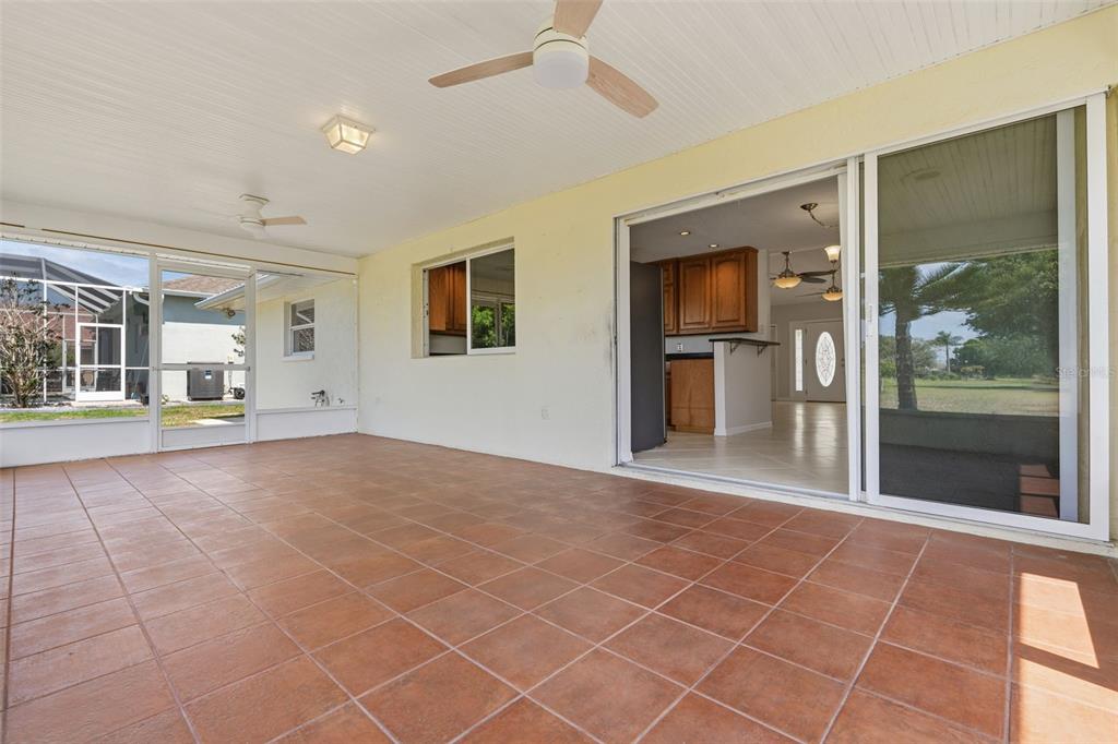 25391 Rupert Road Punta Gorda, FL 33983 - Photo 13 of 38 a view of an empty room with window and refrigerator
