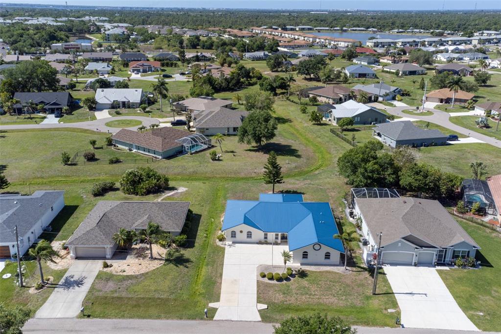 25391 Rupert Road Punta Gorda, FL 33983 - Photo 33 of 38 an aerial view of residential houses with outdoor space