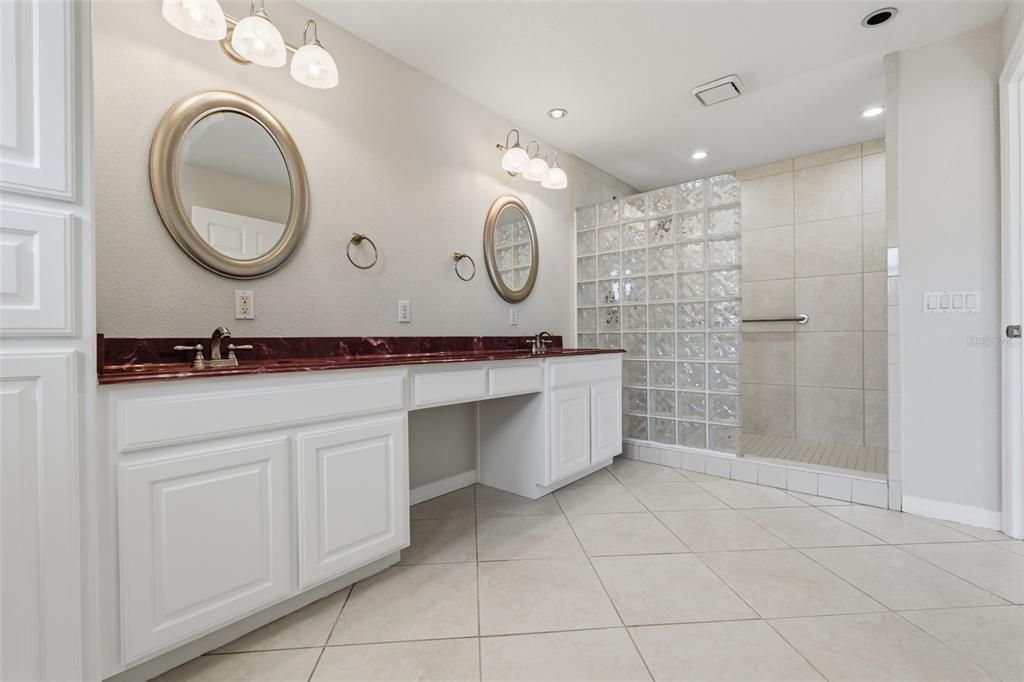 25391 Rupert Road Punta Gorda, FL 33983 - Photo 5 of 38 a bathroom with a sink a toilet and a shower