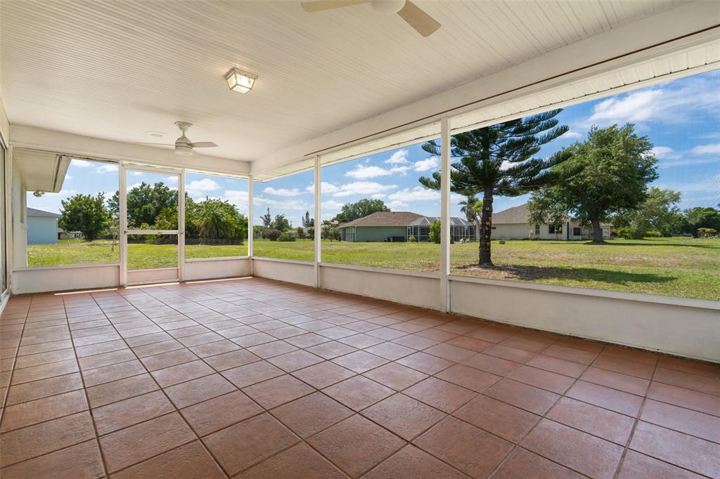 25391 Rupert Road Punta Gorda, FL 33983 - Photo 6 of 38 a view of a room with wooden floor and fence