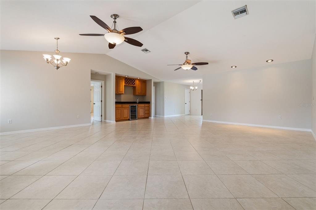 25391 Rupert Road Punta Gorda, FL 33983 - Photo 10 of 38 a view of an empty room with a ceiling fan