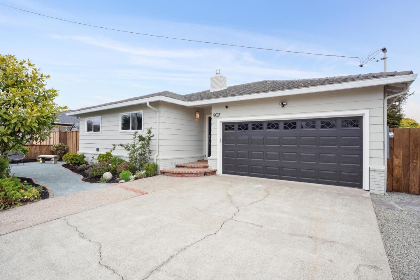 907 3rd Avenue Half Moon Bay, CA 94019 - Photo 1 of 37 a front view of house with yard