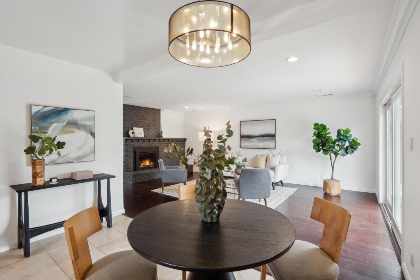907 3rd Avenue Half Moon Bay, CA 94019 - Photo 17 of 37 a view of a dining room with furniture and wooden floor