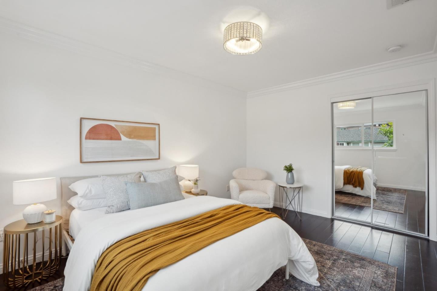 907 3rd Avenue Half Moon Bay, CA 94019 - Photo 19 of 37 a bedroom with a bed and wooden floor