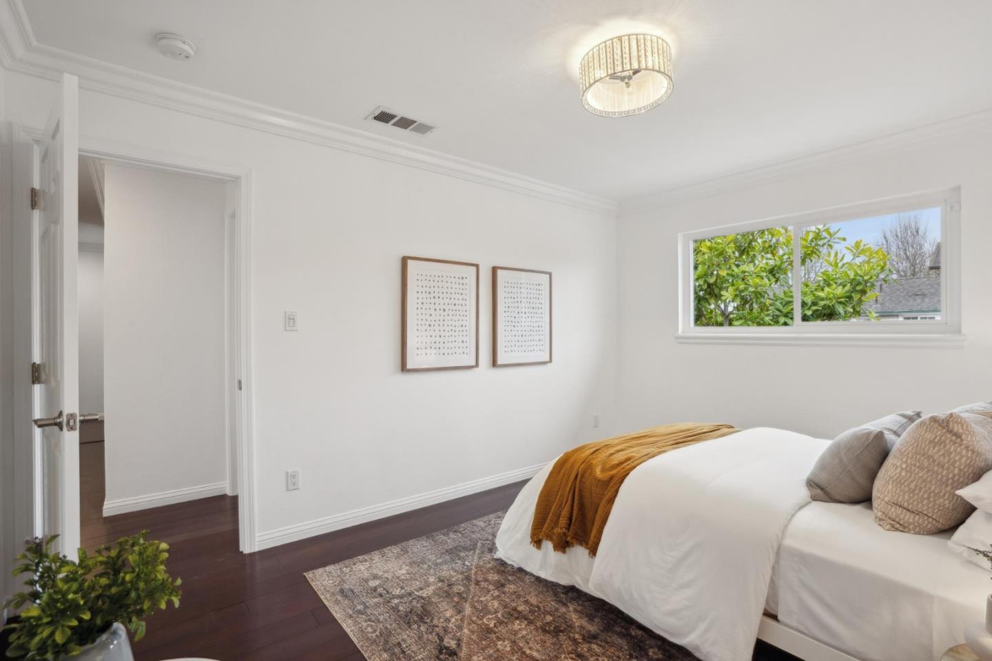 907 3rd Avenue Half Moon Bay, CA 94019 - Photo 20 of 37 a bedroom with a bed and a window