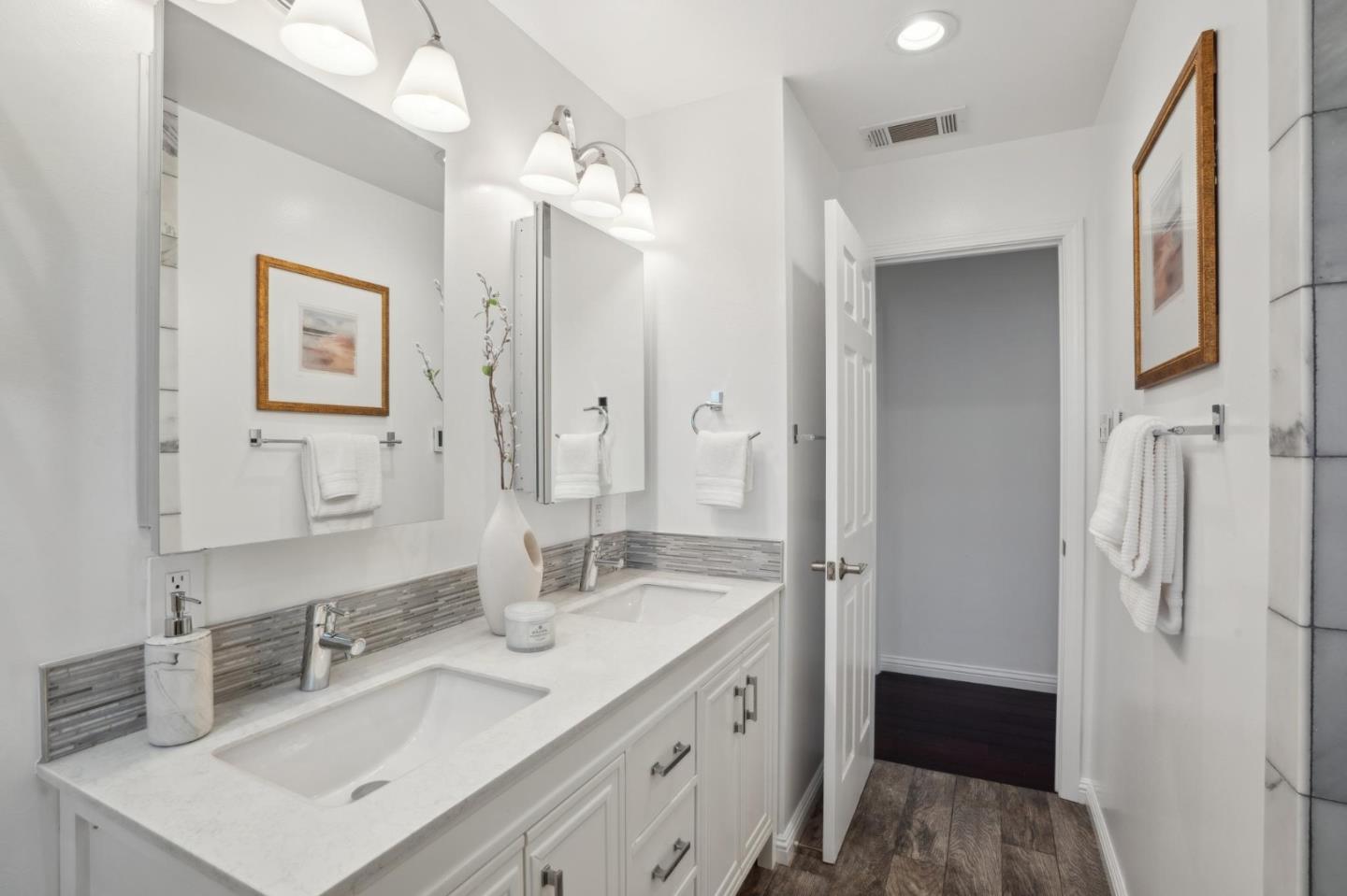 907 3rd Avenue Half Moon Bay, CA 94019 - Photo 23 of 37 a bathroom with a sink double vanity granite tub shower and a mirror