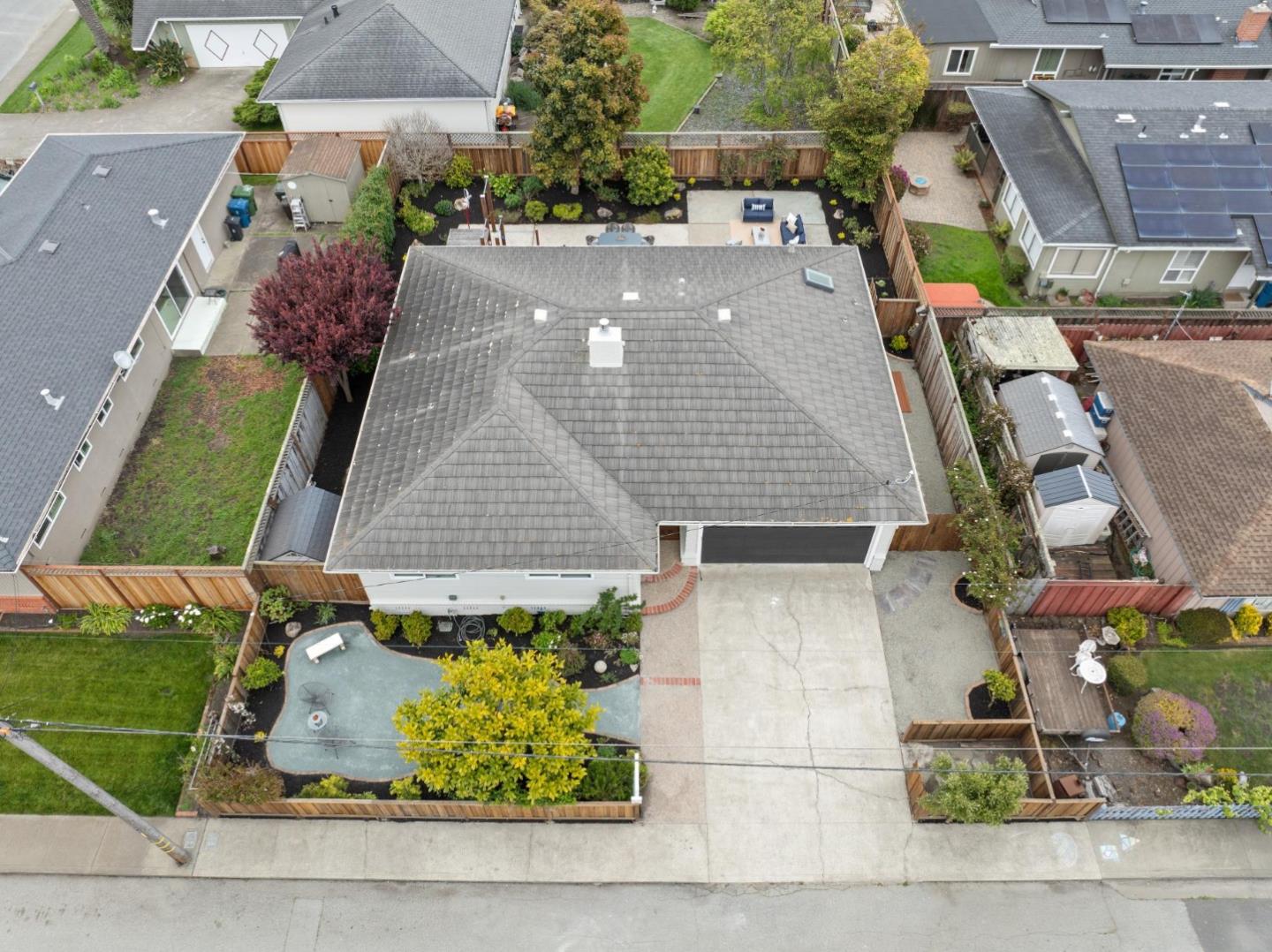 907 3rd Avenue Half Moon Bay, CA 94019 - Photo 35 of 37 an aerial view of a house with a garden and plants