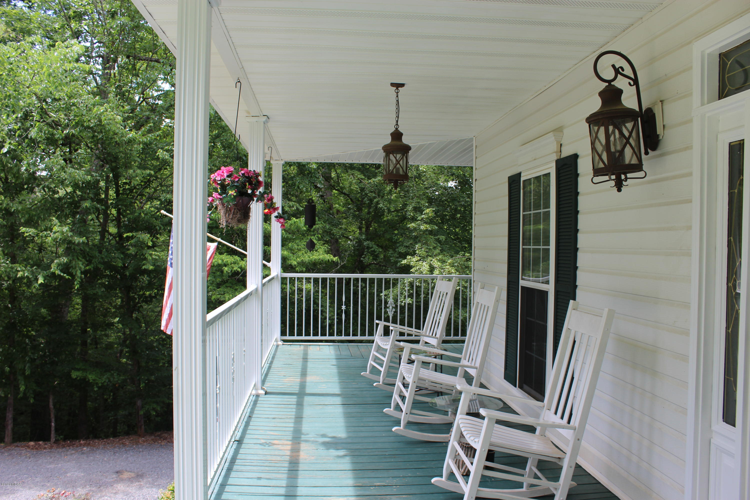 30 Chambless Road Forsyth, GA 31029 - Photo 2 of 27 a view of balcony with furniture and garden