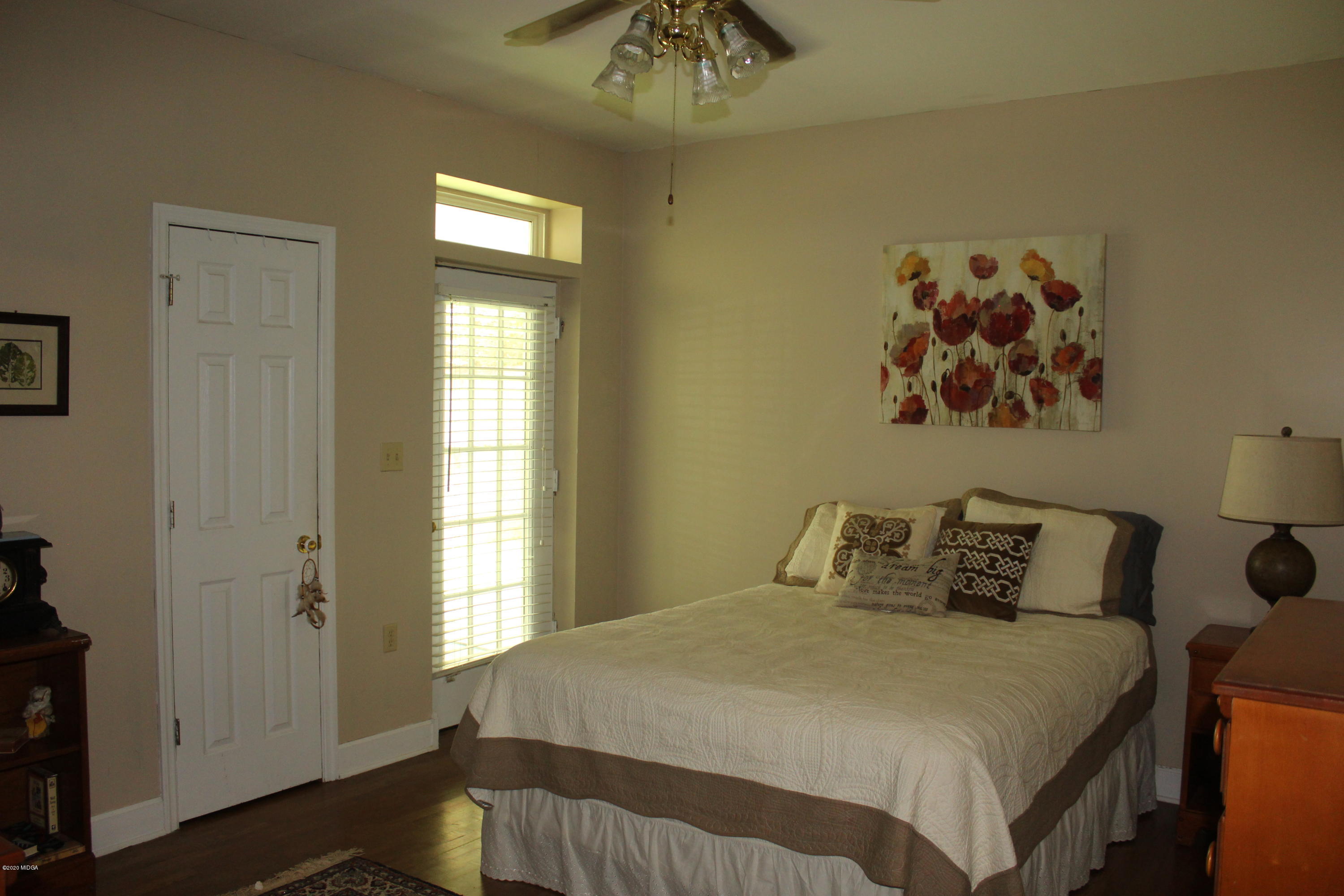 30 Chambless Road Forsyth, GA 31029 - Photo 19 of 27 a bedroom with a bed and a window