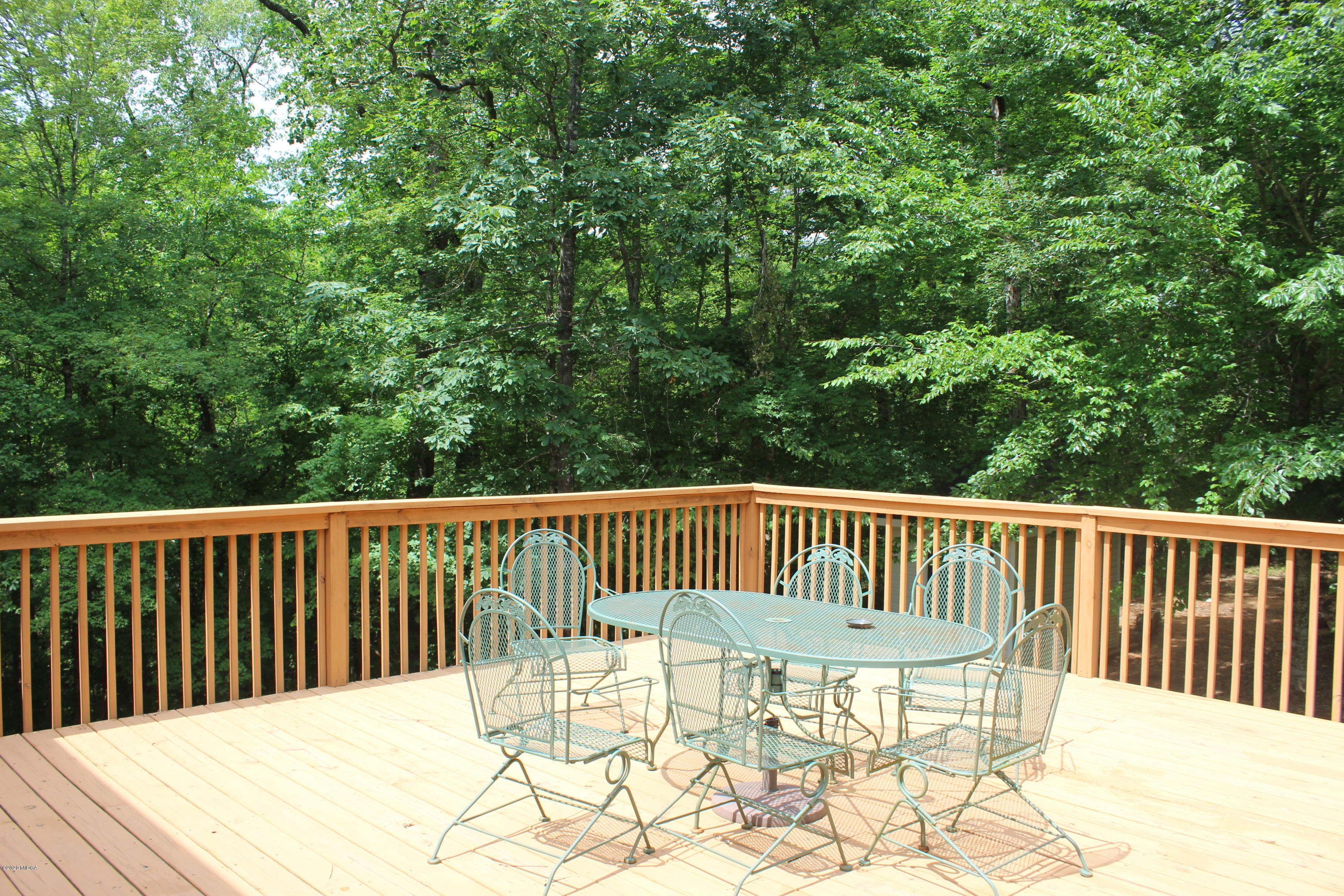 30 Chambless Road Forsyth, GA 31029 - Photo 20 of 27 a view of balcony with wooden floor