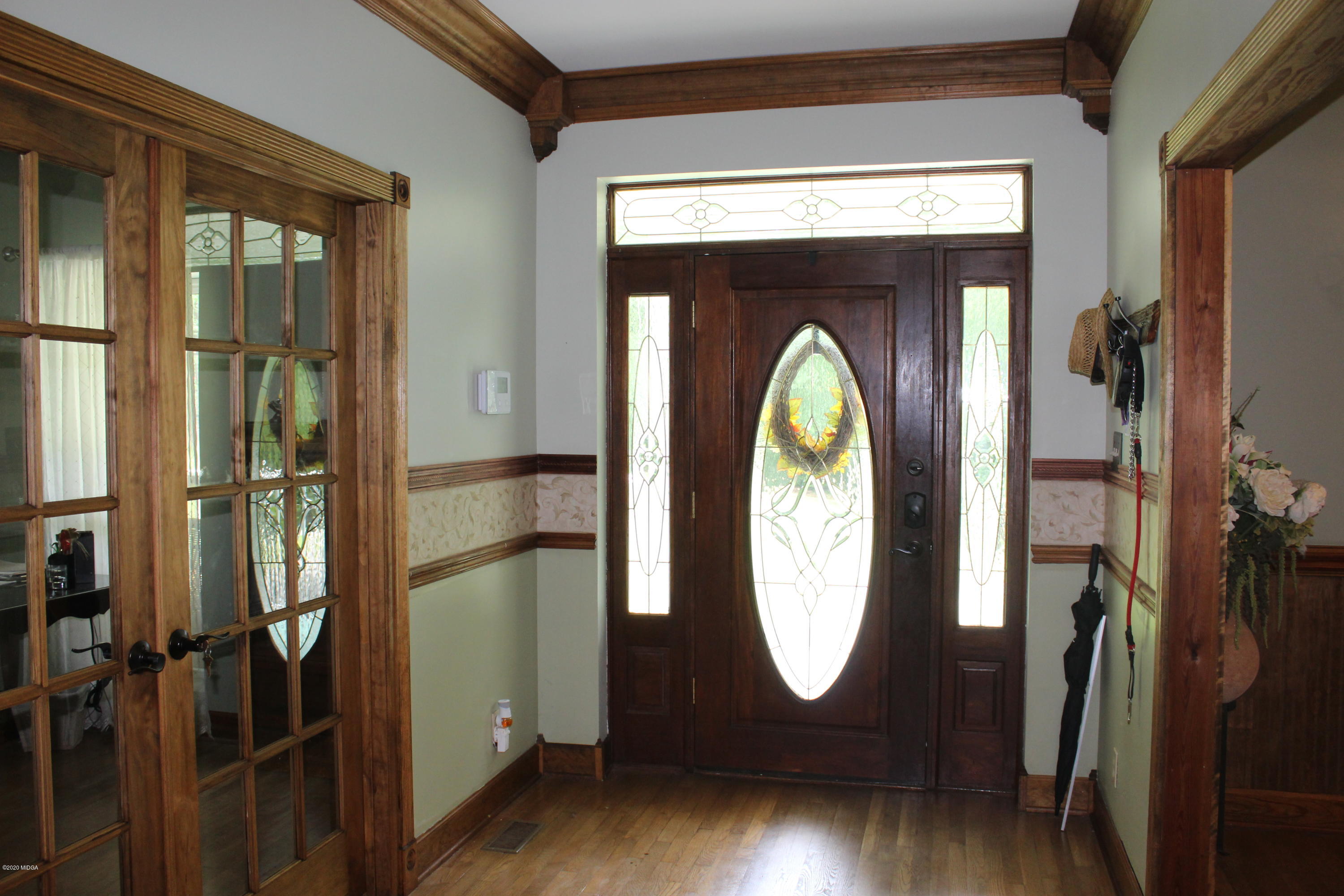 30 Chambless Road Forsyth, GA 31029 - Photo 6 of 27 a living room with entryway and wooden floor