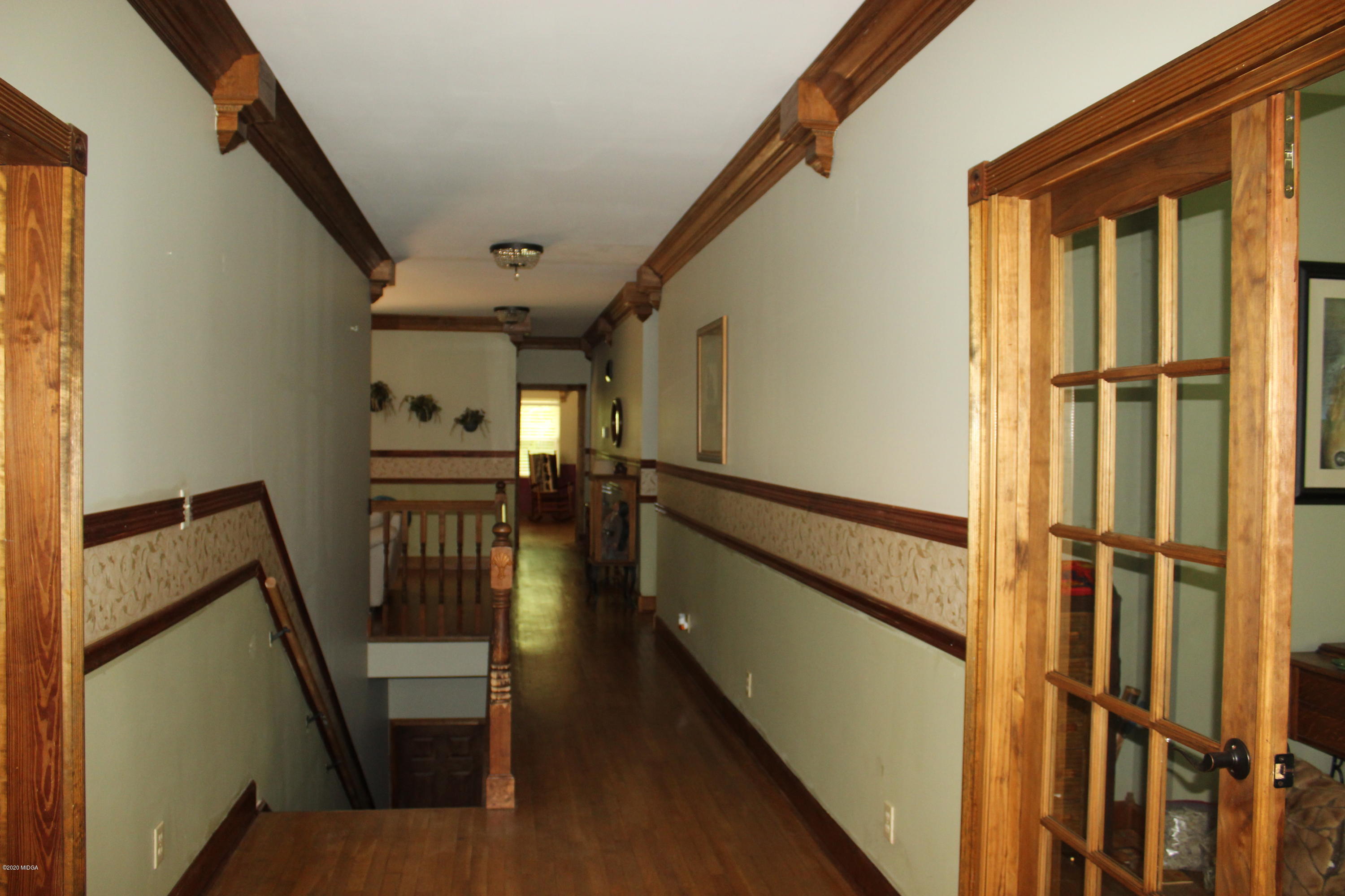 30 Chambless Road Forsyth, GA 31029 - Photo 7 of 27 a view of entryway with furniture and stairs