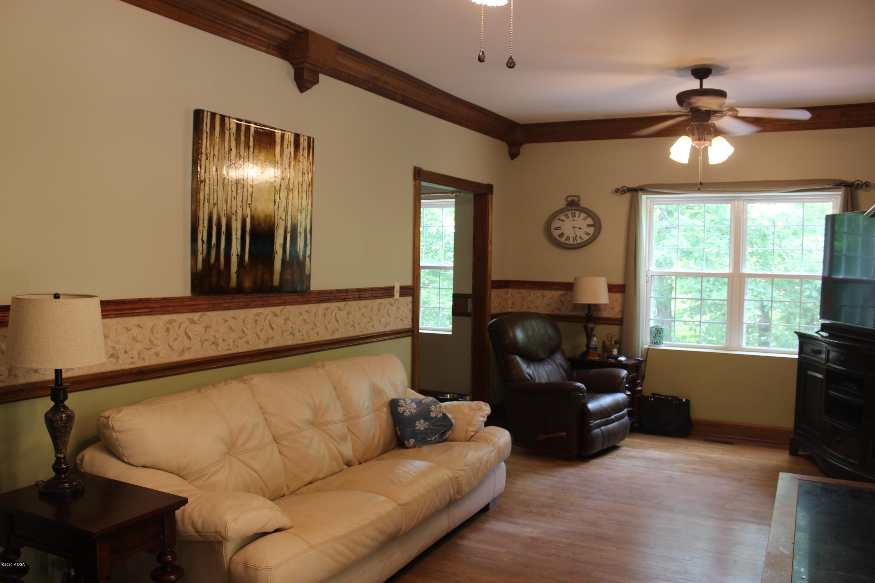 30 Chambless Road Forsyth, GA 31029 - Photo 8 of 27 a living room with furniture and a large window
