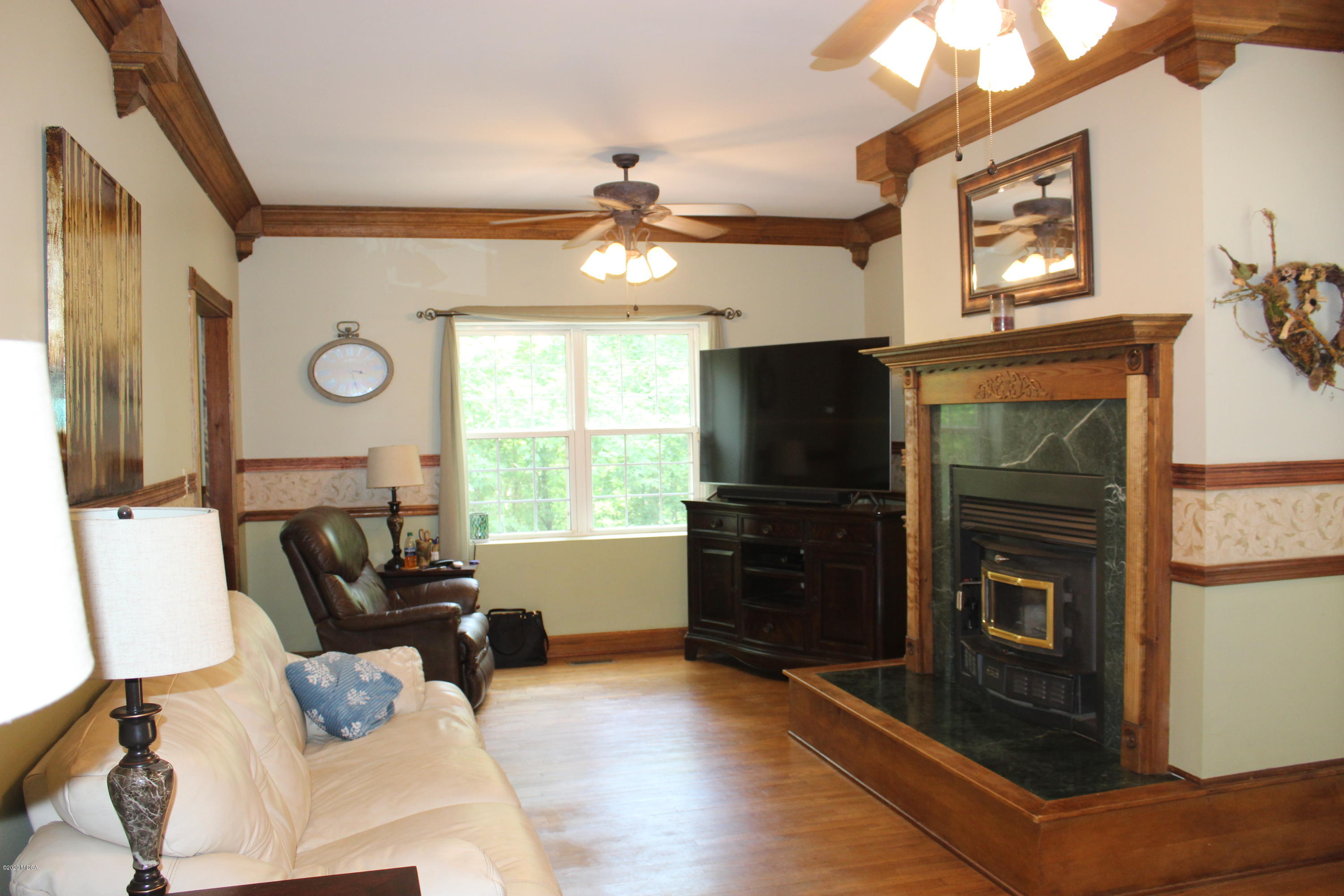 30 Chambless Road Forsyth, GA 31029 - Photo 9 of 27 a living room with furniture and a flat screen tv