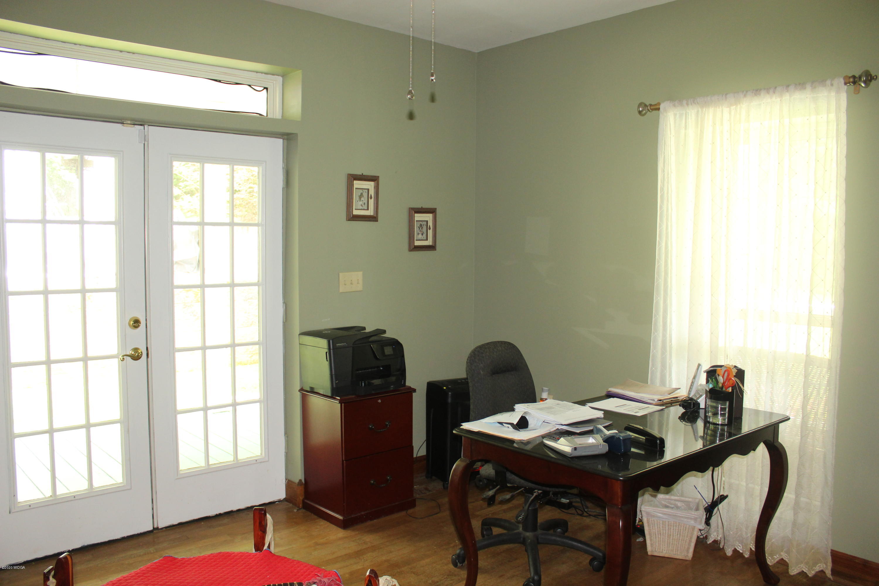 30 Chambless Road Forsyth, GA 31029 - Photo 10 of 27 a view of a workspace with furniture and a window