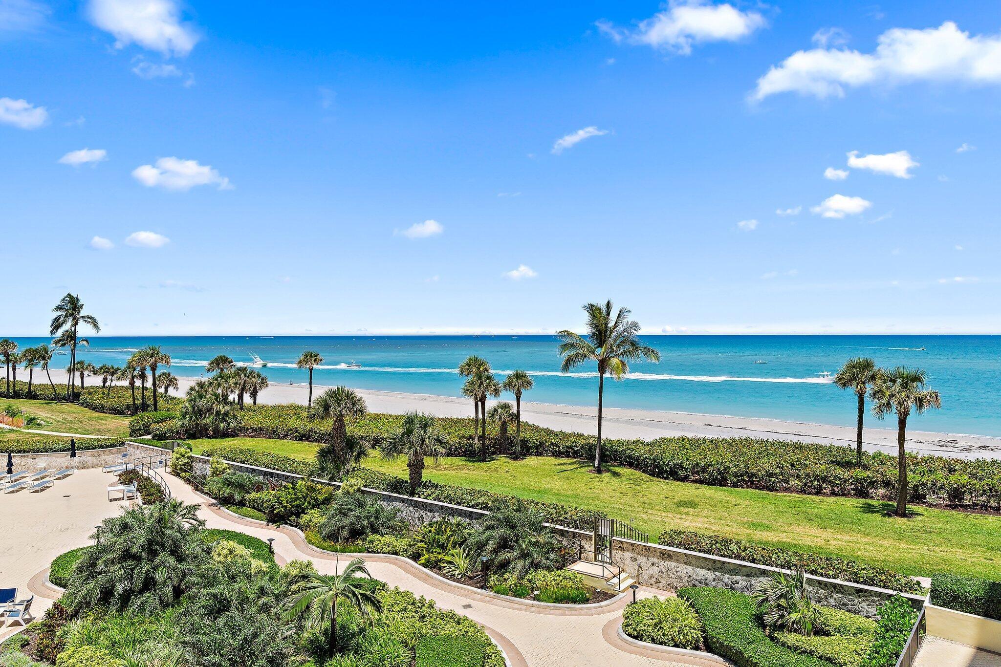 300 Ocean Trail Way, Unit 403 Jupiter, FL 33477 - Photo 31 of 50 a view of a garden with a patio