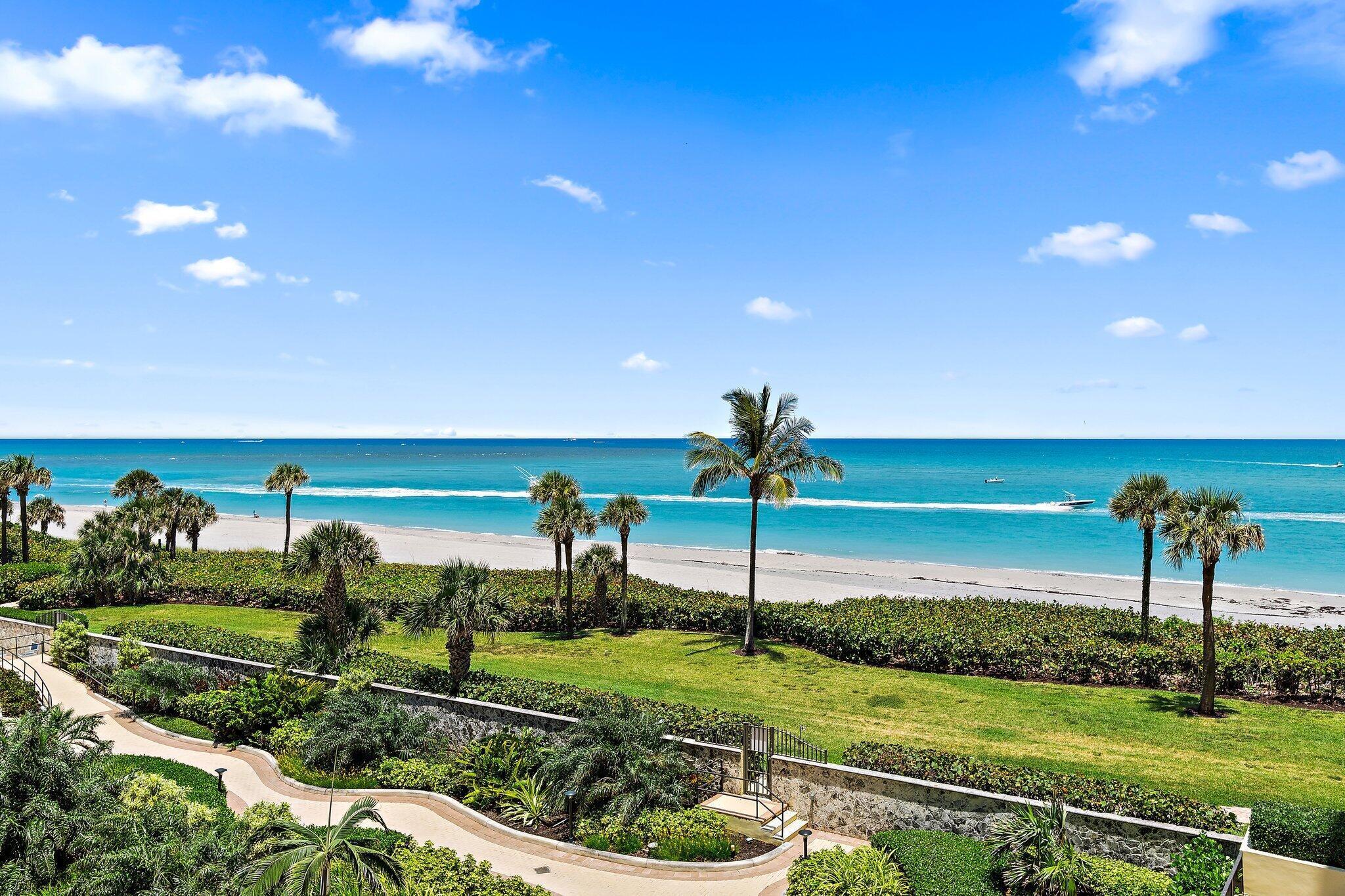 300 Ocean Trail Way, Unit 403 Jupiter, FL 33477 - Photo 32 of 50 a view of a golf course with a garden