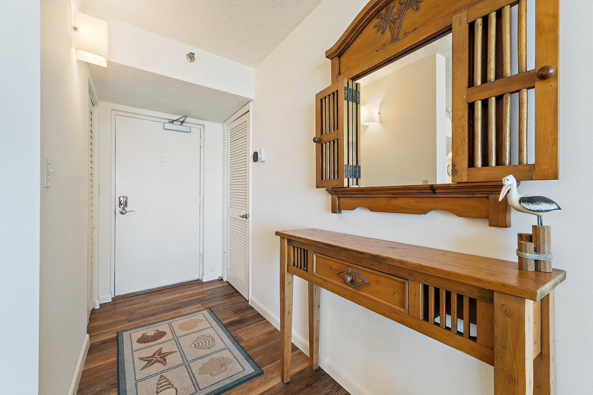 300 Ocean Trail Way, Unit 403 Jupiter, FL 33477 - Photo 9 of 50 a view of an entryway with wooden floor