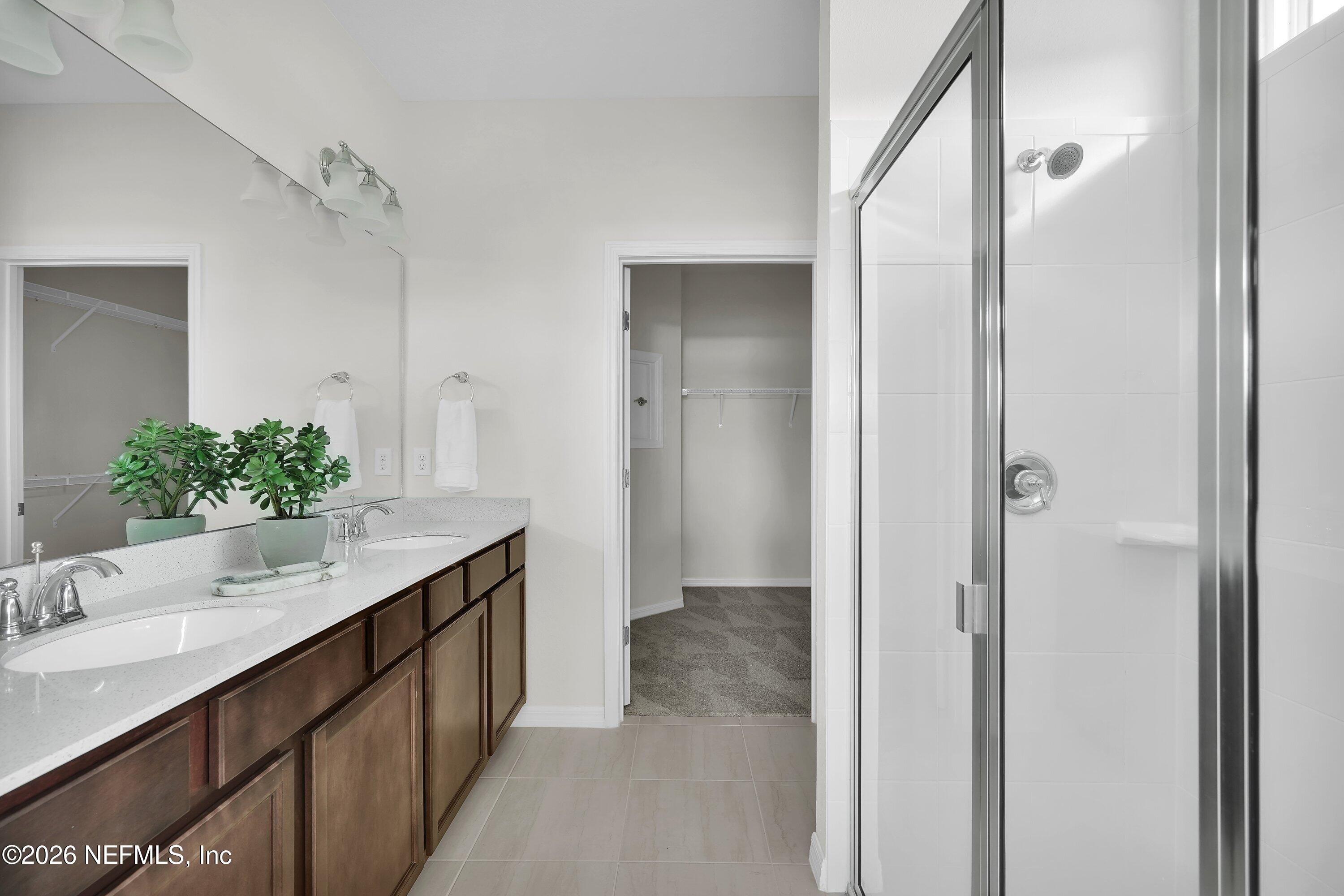 614 Ecliptic Loop Yulee, FL 32097 - Photo 15 of 41 Compass Owner's Bathroom