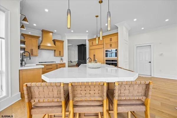 a bedroom with a large bed and a flat screen tv