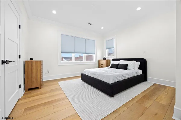 a view of an empty room with windows