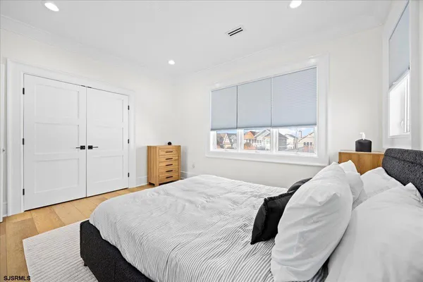 a very nice looking room with a large window and a view of living room