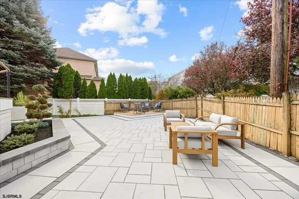 an aerial view of a house with a garden