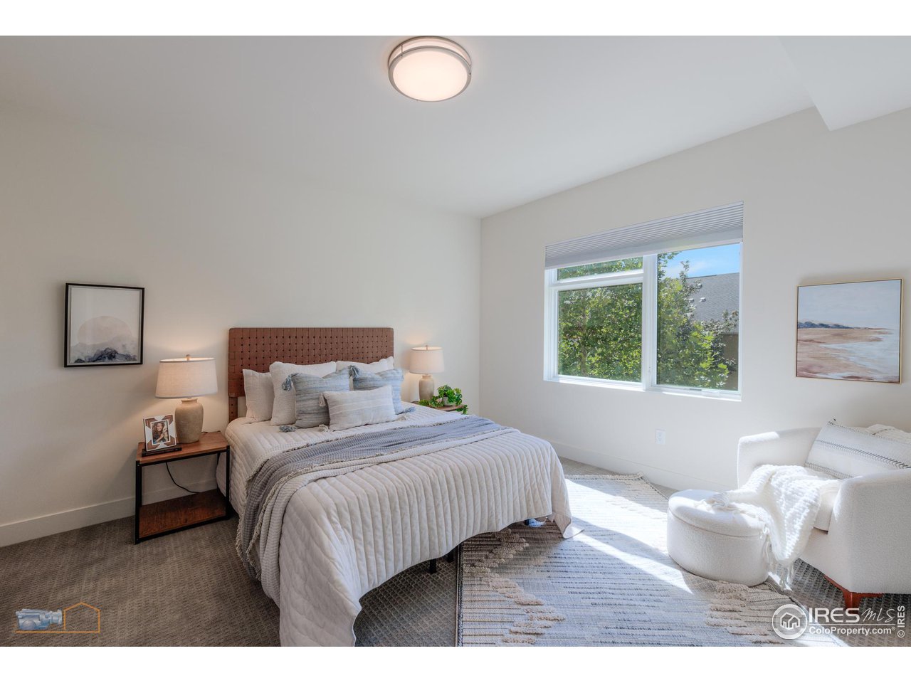 3105 Bluff Street Boulder, CO 80301 - Photo 23 of 40 a bedroom with a bed and a window